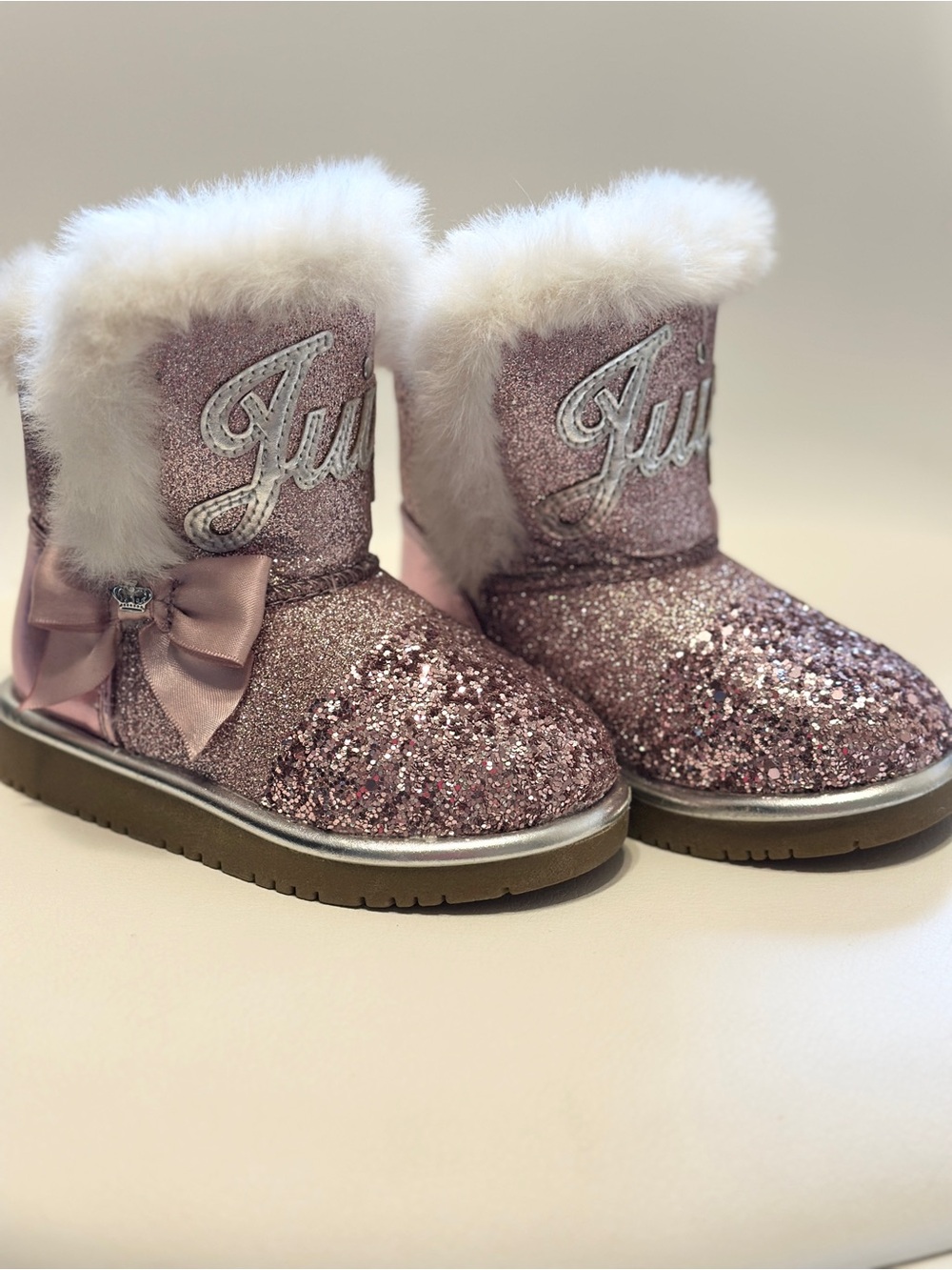 Juicy Couture Sparkle Pink Faux-Fur Bow Boots for toddler girls. Size 6M.